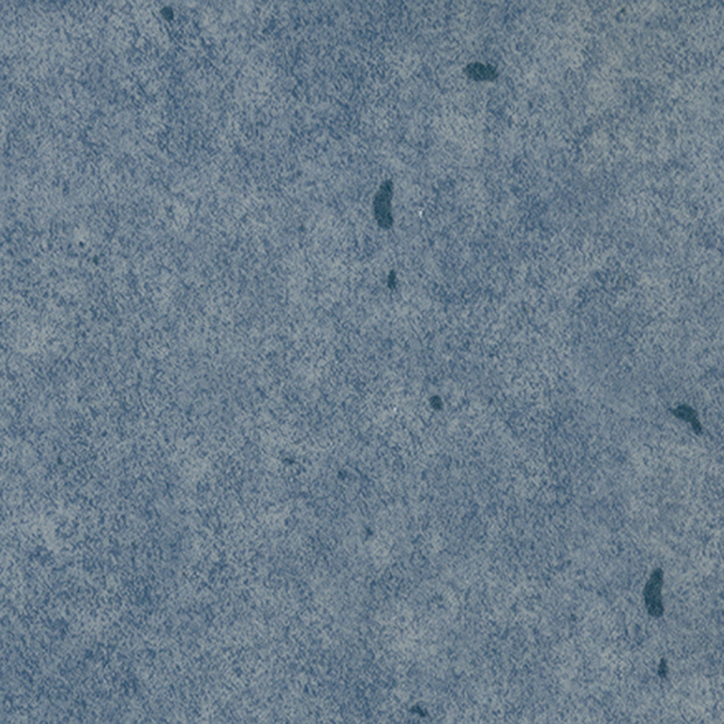 Revêtement de sol hétérogène à couche dense