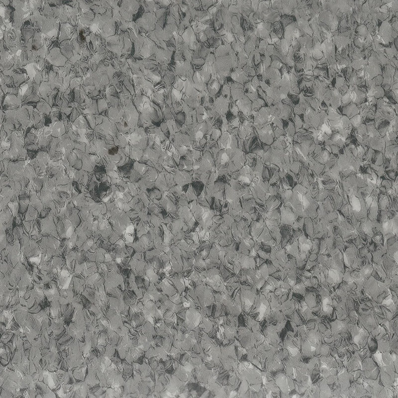 Revêtement de sol hétérogène haute durabilité et résistant aux taches